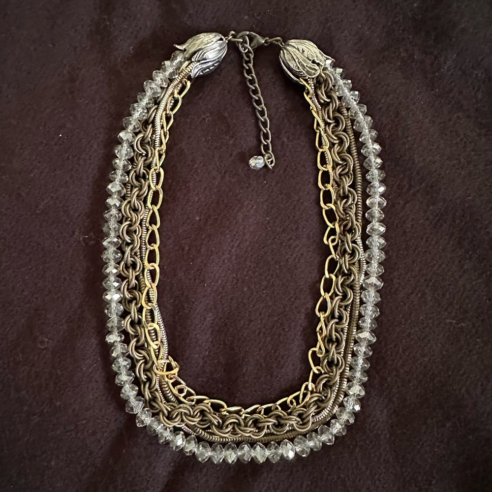 Gorgeous multi-strand crystal and metal necklace. 17” with 3” extender.